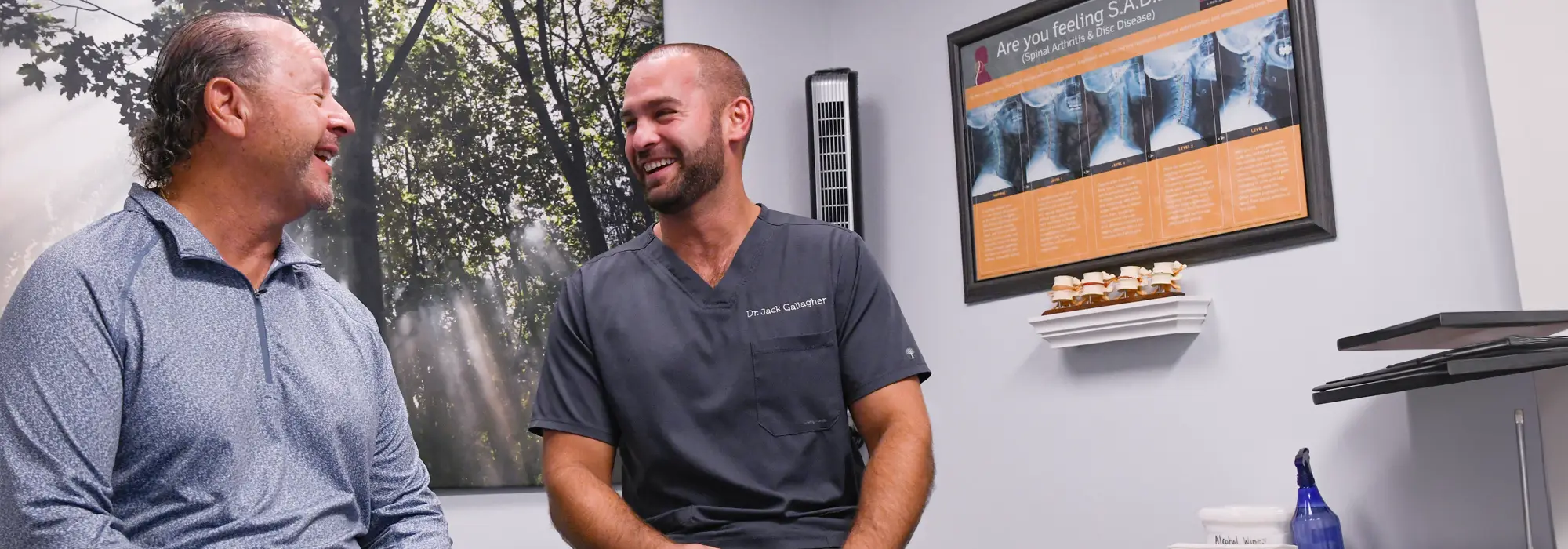 Chiropractor Louisville KY Jack Gallagher with Patient Chiropractor Louisville KY Jack Gallagher with Patient